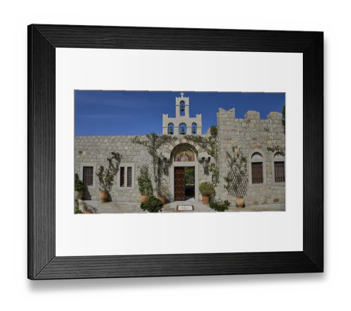Framed Print : Church facade with bell tower and religious icon