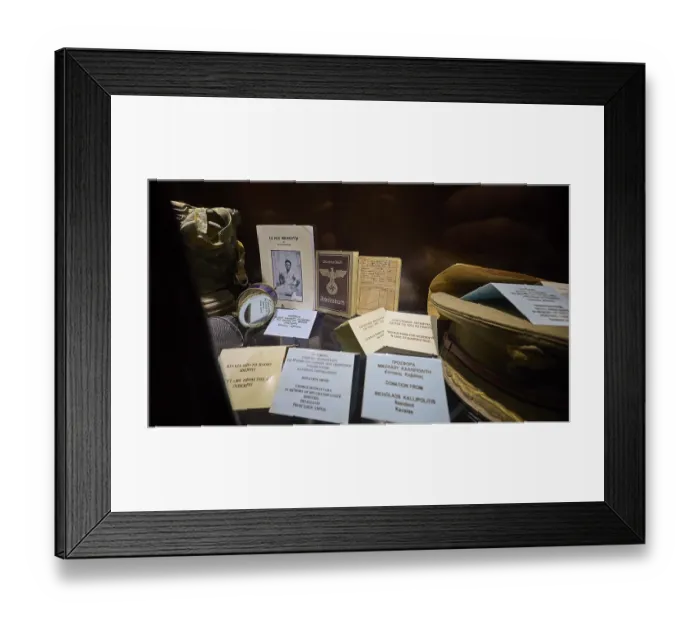 Framed Print : Display case with historical documents and memorabilia