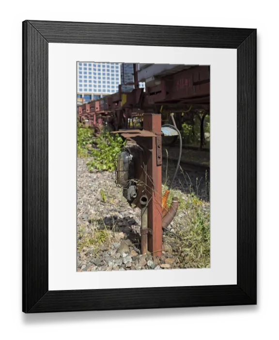 Framed Print : Closeup of old lamp and electrical junction box at railway freight station