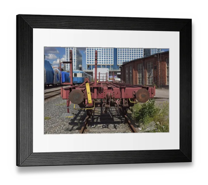 Framed Print : Old freight train car standing at railway yard in summer