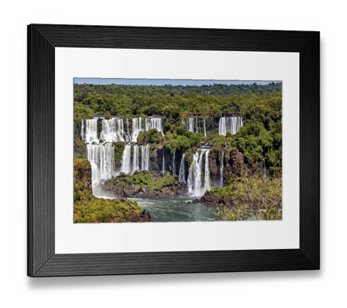 Framed Print : Panoramic view of lush waterfalls amidst dense vegetation