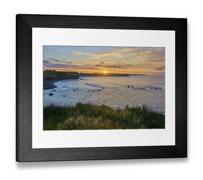 Framed Print : Impressive sunrise on the coast with bright sky and peaceful atmosphere
