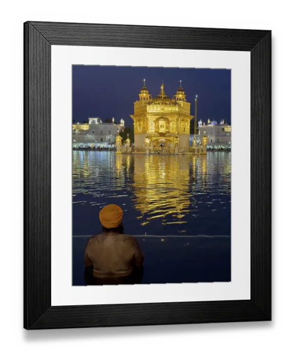 Framed Print : Devout Sikh bathing in an artificial lake