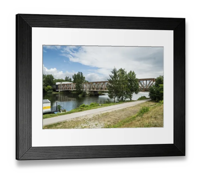 Framed Print : The old railway bridge being converted into the Fiesta Bridge over the Vah River
