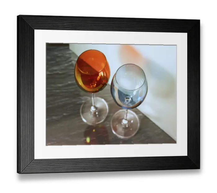 Framed Print : Two coloured wine glasses, studio shot Framed Print : Two coloured wine glasses, studio shot