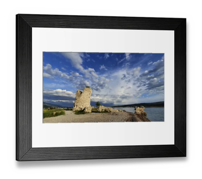 Framed Print : Panoramic view of a ruin on the waterfront in a cloudy blue sky Framed Print : Panoramic view of a ruin on the waterfront in a cloudy blue sky