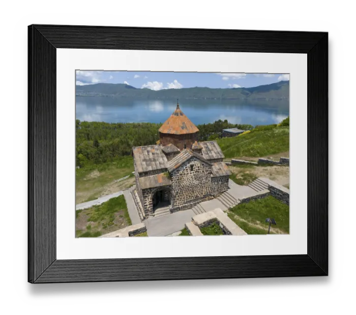 Framed Print : Tranquil view of a historic monastery with mountain and lake views under a clear sky