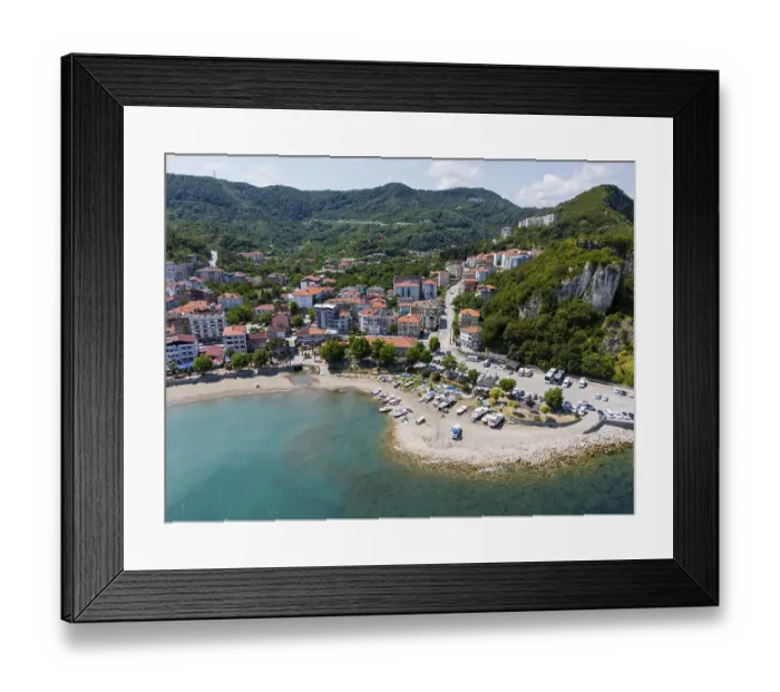 Framed Print : Coastal area with beach and boats on a coastal road