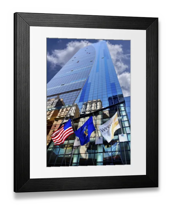 Framed Print : Skyscraper facade with flags and reflection in the glass facade