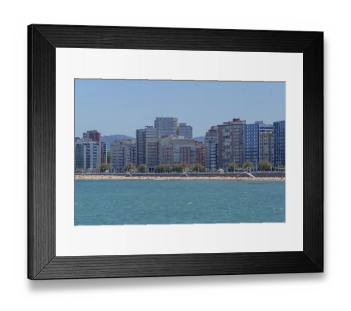 Framed Print : Urban skyline on the waterfront with tall buildings and clear sky Framed Print : Urban skyline on the waterfront with tall buildings and clear sky