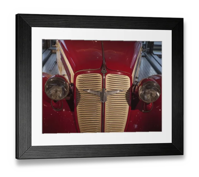 Framed Print : Front view of a red classic car