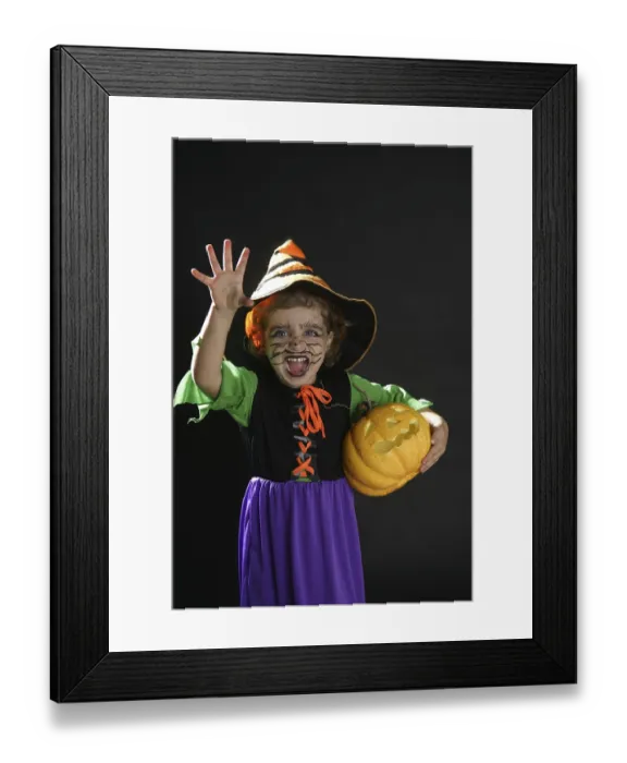 Framed Print : Toddler beautiful witch girl wearing halloween costume and make up Framed Print : Toddler beautiful witch girl wearing halloween costume and make up