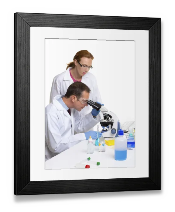 Framed Print : Laboratory with two scientist working with test tubes flask and microscope