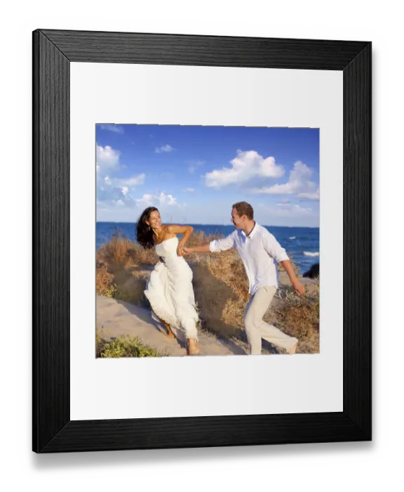 Framed Print : Couple in love running at the beach on Mediterranean Framed Print : Couple in love running at the beach on Mediterranean