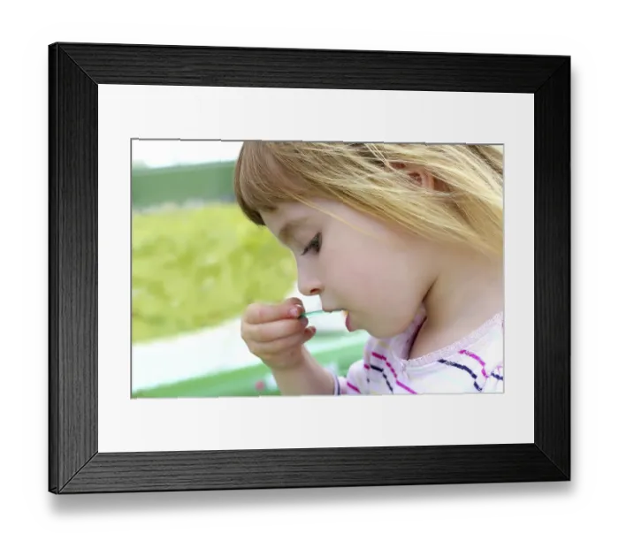 Framed Print : Blond little girl eating ice cream color spoon portrait