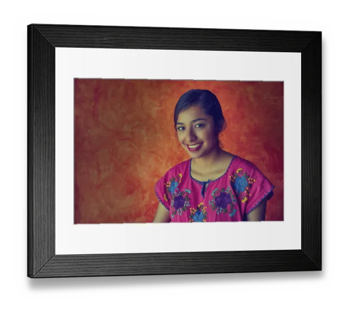 Framed Print : Mexican woman with mayan dress latin ethnicity on orange background