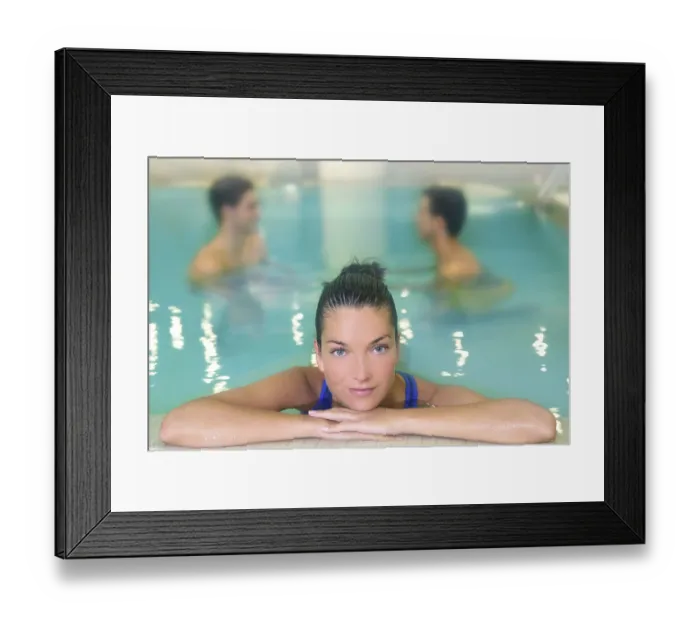 Framed Print : Spa woman portrait relaxed in pool water men in background