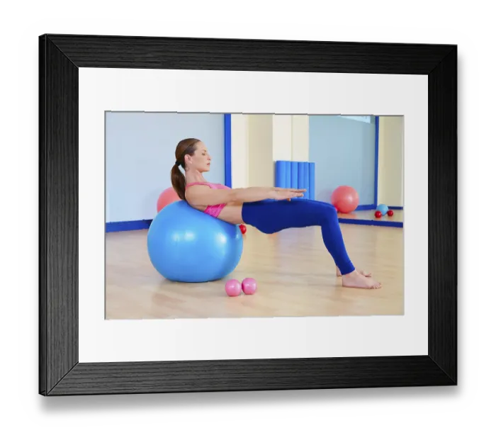Framed Print : Pilates woman fitball swiss ball exercise workout at gym indoor Framed Print : Pilates woman fitball swiss ball exercise workout at gym indoor
