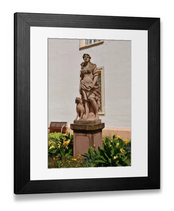 Framed Print : Ettlingen, Germany - August 2025: Sculpture of hunting goddess Diana in the castle garden of Ettlingen Framed Print : Ettlingen, Germany - August 2025: Sculpture of hunting goddess Diana in the castle garden of Ettlingen
