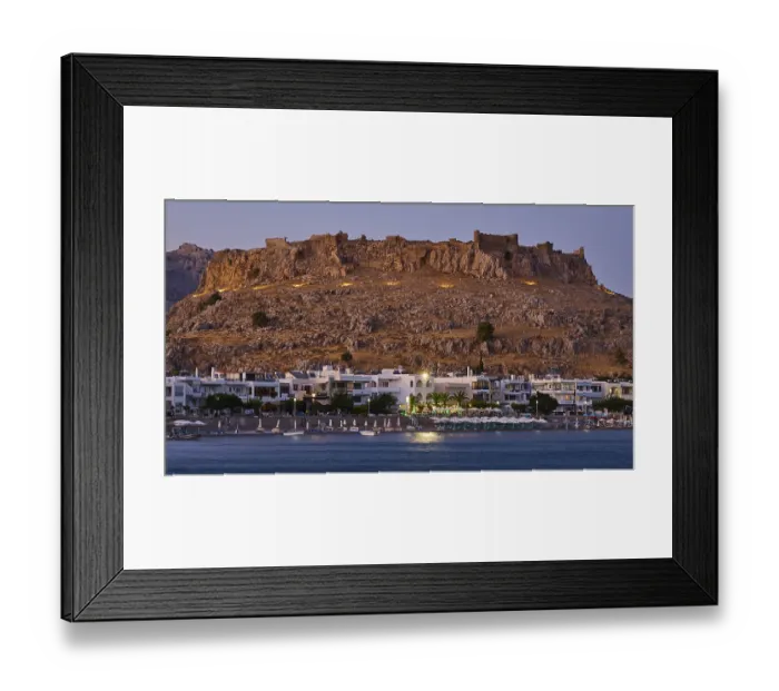 Framed Print : Feraklos fortress, Old castle at dusk with illuminated town and calm sea below Framed Print : Feraklos fortress, Old castle at dusk with illuminated town and calm sea below