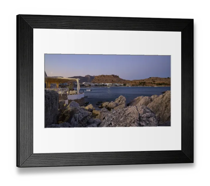 Framed Print : Restaurant Argo, Rock-framed view of a coastal town and sea at dusk Framed Print : Restaurant Argo, Rock-framed view of a coastal town and sea at dusk
