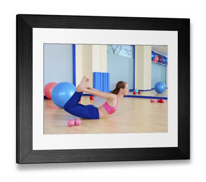 Framed Print : Pilates woman fitball rocking exercise workout at gym indoor Framed Print : Pilates woman fitball rocking exercise workout at gym indoor