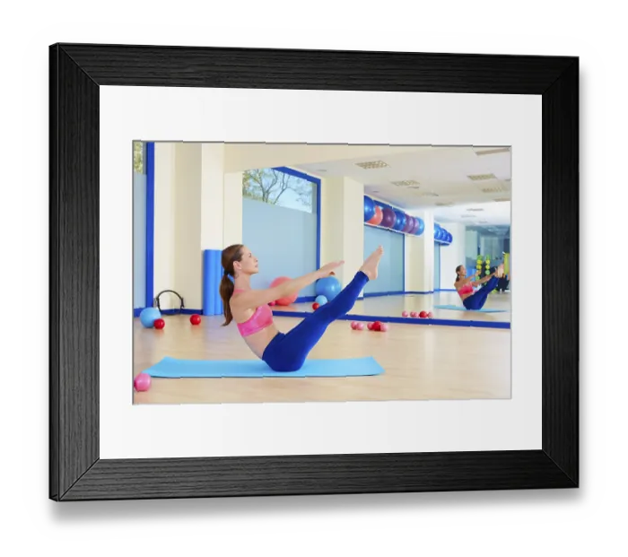 Framed Print : Pilates woman teaser exercise workout at gym indoor