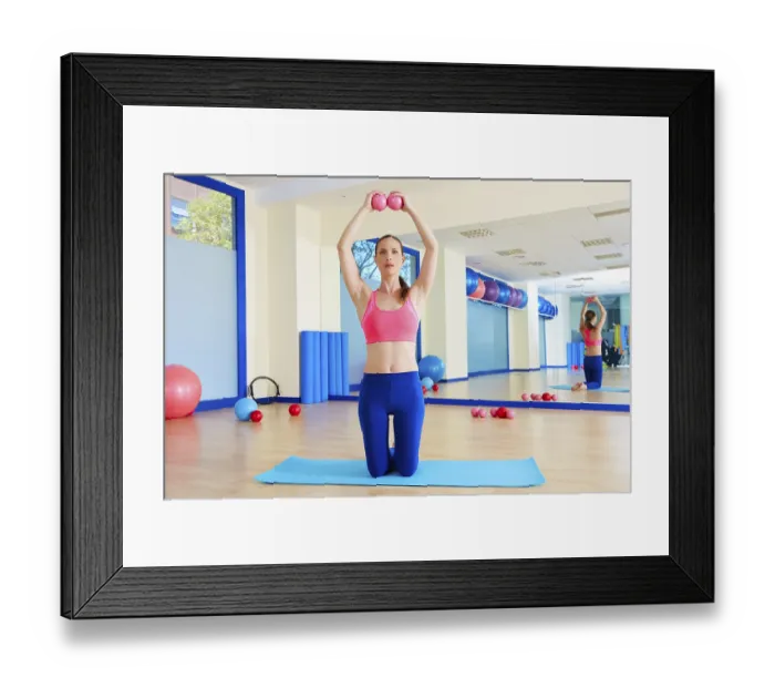 Framed Print : Pilates woman sand balls exercise workout at gym indoor