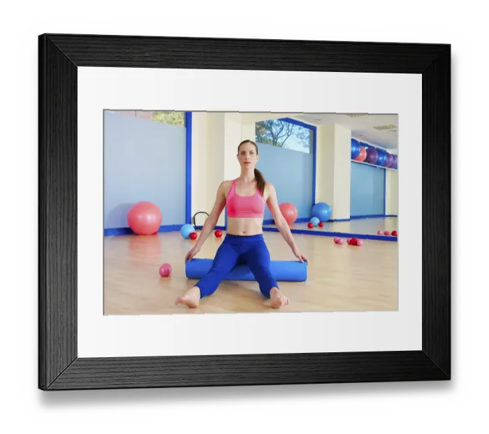 Framed Print : Pilates woman roller sit roll exercise workout at gym indoor