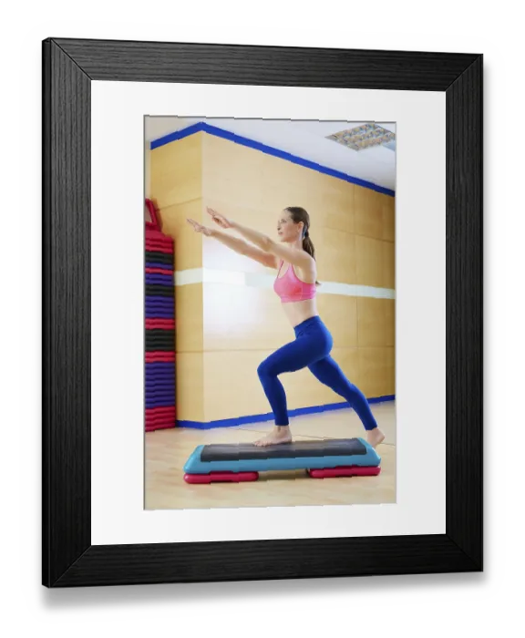 Framed Print : Stepper step woman exercise workout at gym indoor