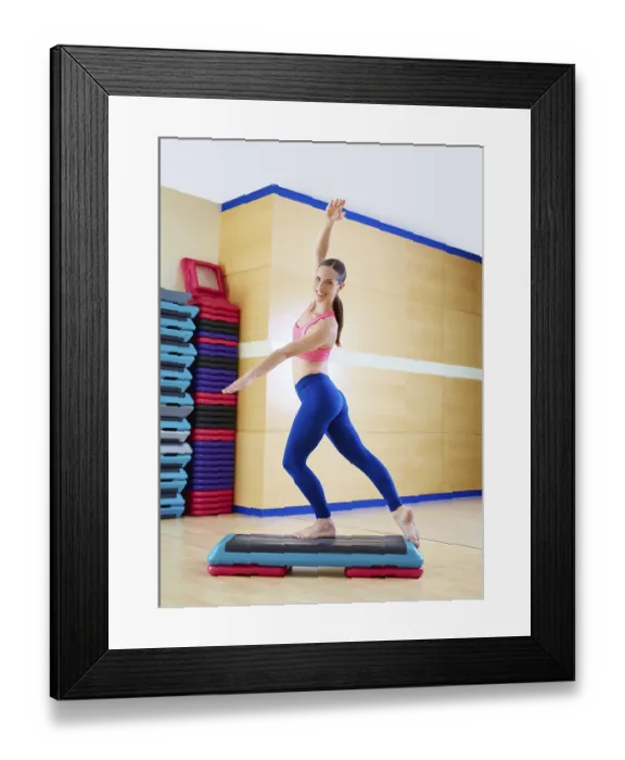 Framed Print : Stepper step woman exercise workout at gym indoor