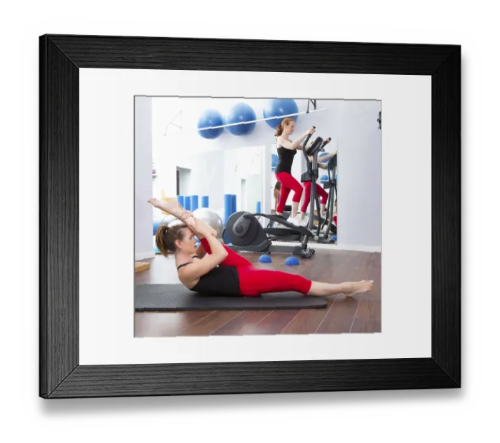 Framed Print : Aerobics pilates gym women group with crosstrainer