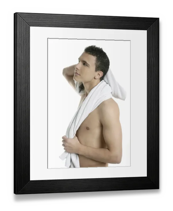 Framed Print : Young handsome man after bath with white towel isolated Framed Print : Young handsome man after bath with white towel isolated