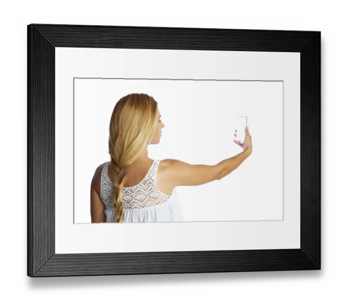 Framed Print : Blond tourist girl taking photos with smartphone on white background and braid