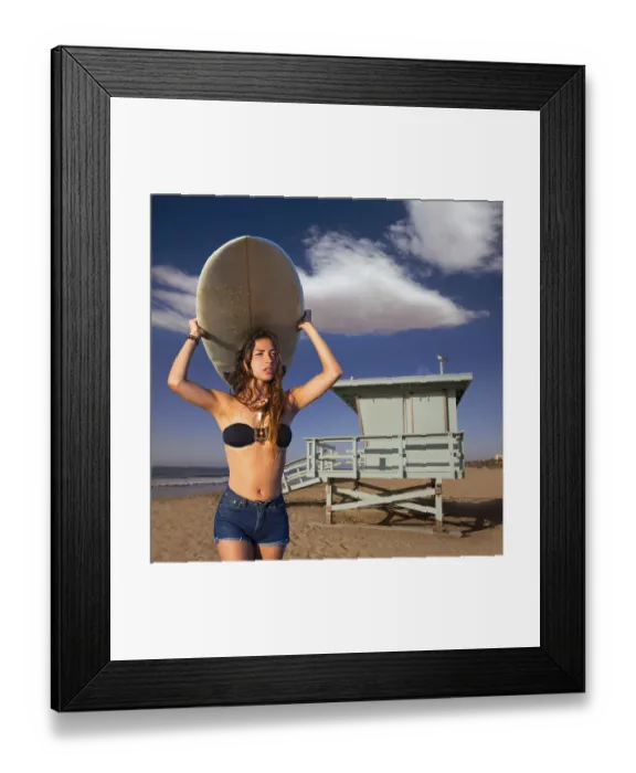 Framed Print : Brunette surfer teen girl holding surfboard in Santa Monica beach California Framed Print : Brunette surfer teen girl holding surfboard in Santa Monica beach California