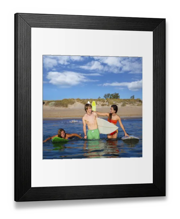 Framed Print : Happy beautiful teen surfers talking on beach shore smiling