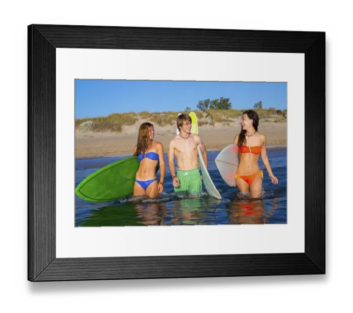 Framed Print : Happy beautiful teen surfers talking on beach shore smiling Framed Print : Happy beautiful teen surfers talking on beach shore smiling