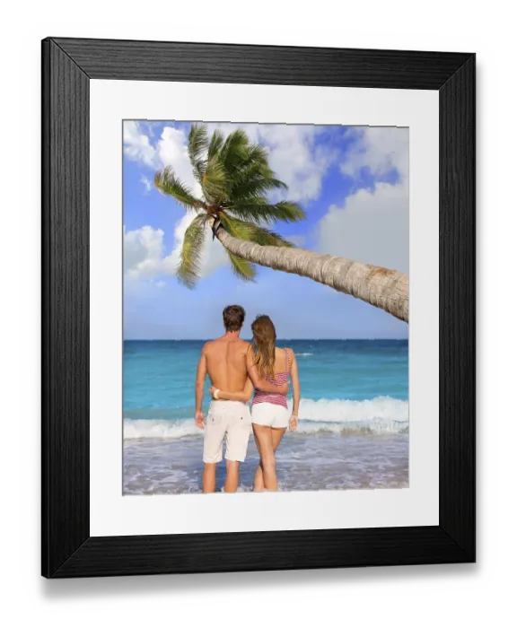 Framed Print : Couple of young tourists in a tropical summer beach with coconut palm trees Framed Print : Couple of young tourists in a tropical summer beach with coconut palm trees