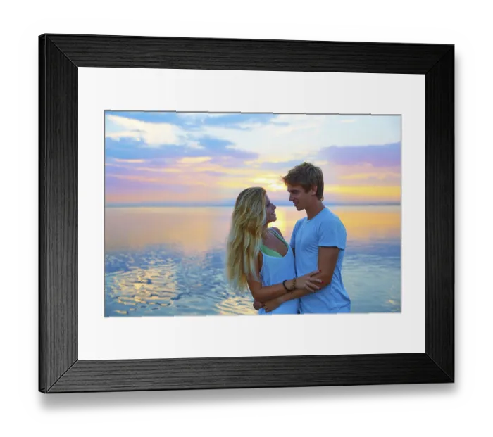 Framed Print : Blond young couple hug in sunset sea lake happy together Framed Print : Blond young couple hug in sunset sea lake happy together
