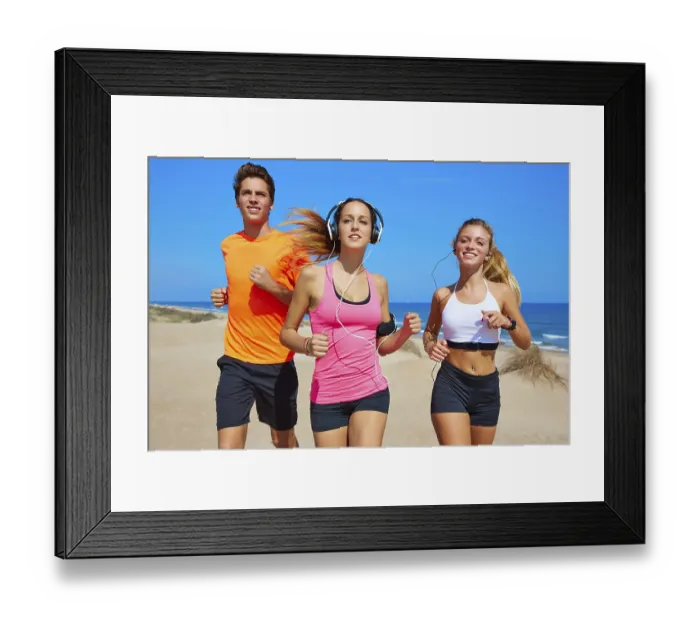 Framed Print : Friends running on the beach happy in summer sunny day