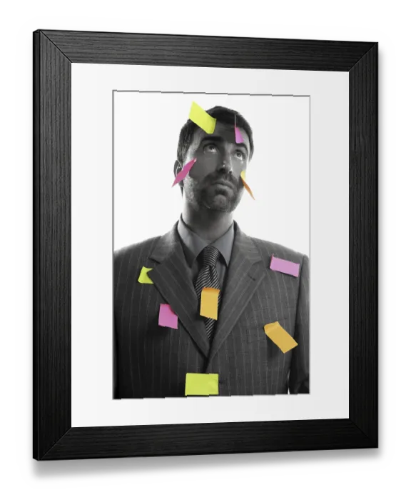 Framed Print : Businessman full of memo stock message notes over white studio background