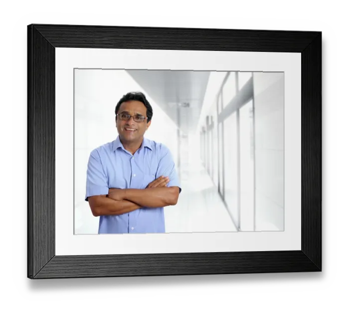 Framed Print : Indian latin businessman glasses blue shirt in modern office corridor Framed Print : Indian latin businessman glasses blue shirt in modern office corridor
