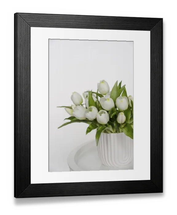 Framed Print : White tulips in vase on round table, copy space