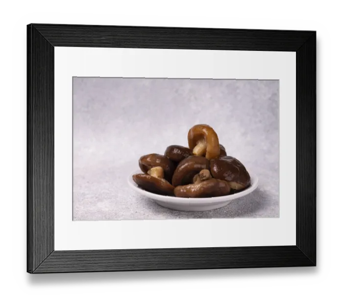 Framed Print : Pickled milk mushrooms lie on a white plate
