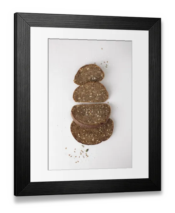 Framed Print : Pieces of rye bread with seeds, flat lay