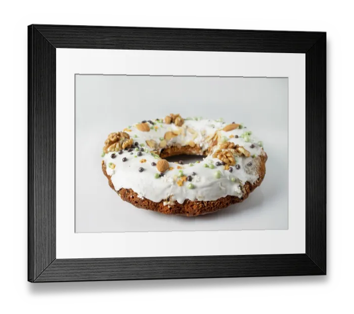 Framed Print : Christmas cake in sugar icing, with walnuts and almonds Framed Print : Christmas cake in sugar icing, with walnuts and almonds