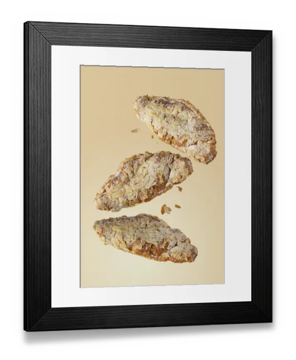 Framed Print : Almond croissants with crumbs on yellow background