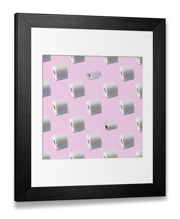 Framed Print : Rolls of white toilet paper on a pink background