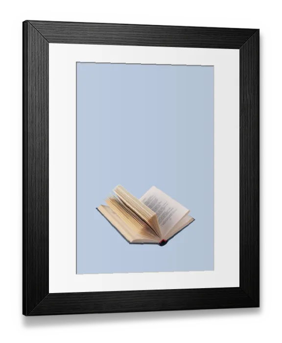 Framed Print : Open book in a blue cover on a blue background