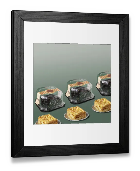 Framed Print : Layered cake with cream and an empty box on a green background Framed Print : Layered cake with cream and an empty box on a green background